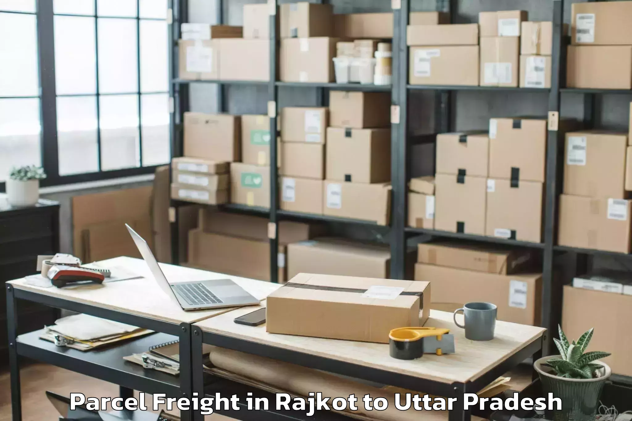 Book Rajkot to Karwi Parcel Freight Online